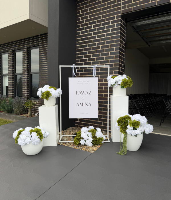 White Welcome Sign Frame with Floral Display